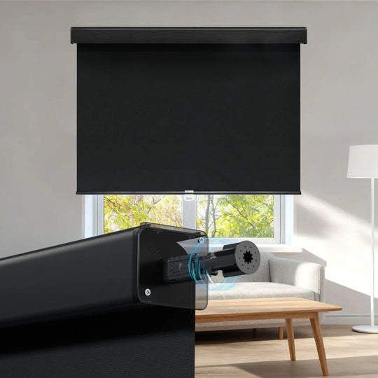 Black roller shade above sofa and coffee table with spring mechanism close-up inset