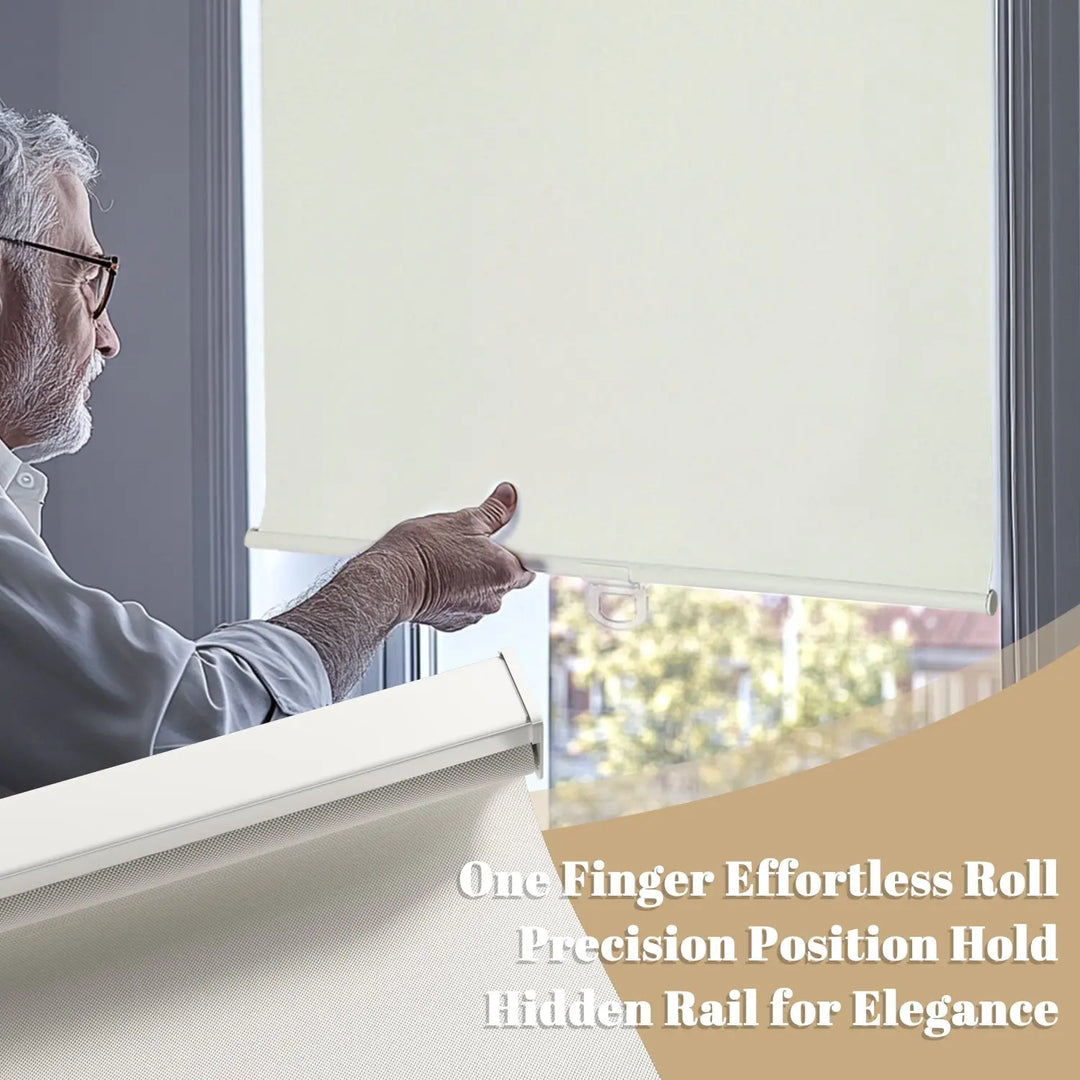 Person using hem handle on light beige roller shade with bottom rail close-up inset