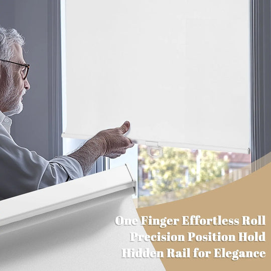 Person using hem handle on white roller shade with bottom rail close-up inset